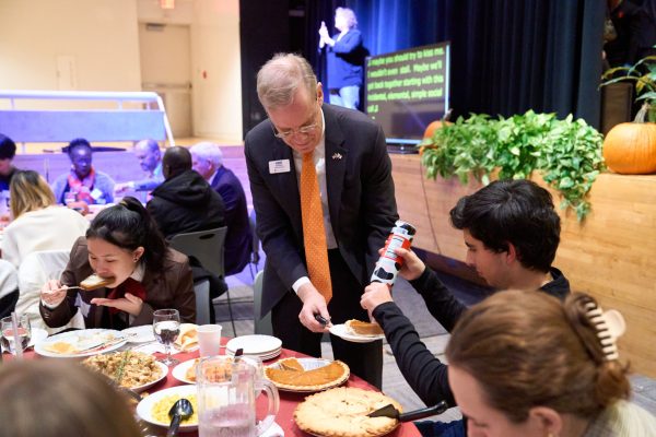 Chancellor Syverud with students at the International Thanksgiving Celebration