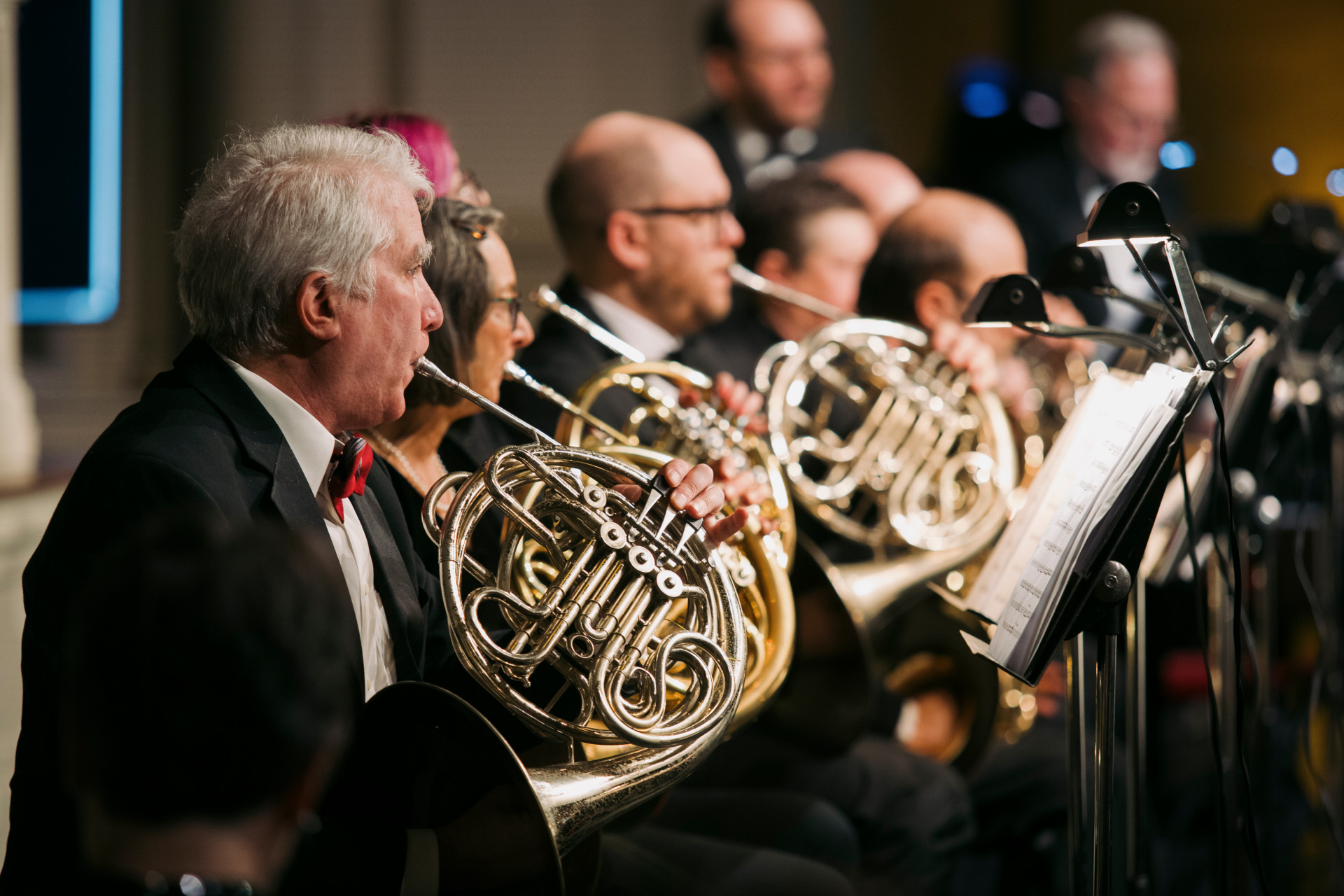 Syracuse University Brass Ensemble French horn section performs at Horns and Harmonies at Hendricks Chapel on Dec. 15