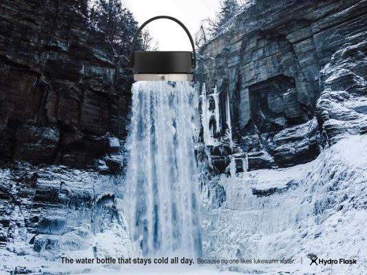 A hydroflask is superimposed over a waterfall.