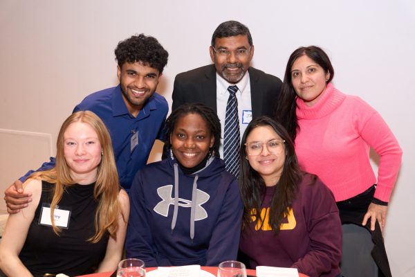 Evangelical Christian Chaplain Jay Koshy with students