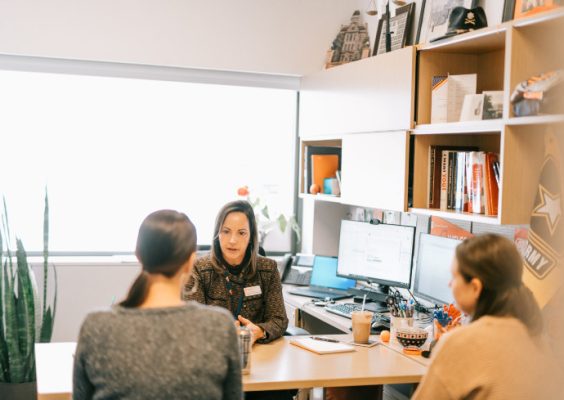 Professor Beth Kubala works with students