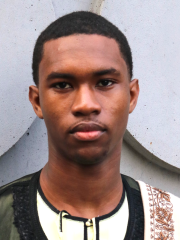 young man with serious expression looking forward