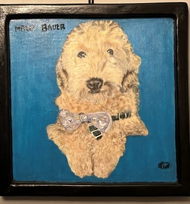 a painting of a yellow dog on a medium blue background in a black wooden frame