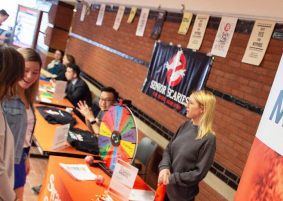 people attending a financial literacy student outreach and tabling event