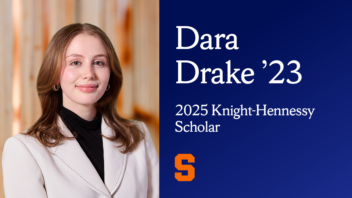 A professional headshot of a person wearing a white blazer and standing against a blurred background. The right side of the image has a blue background with white text that reads 'Dara Drake '23' and '2025 Knight-Hennessy Scholar.' There is also an orange Block S at the bottom.