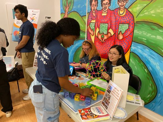 Woman at an informational table