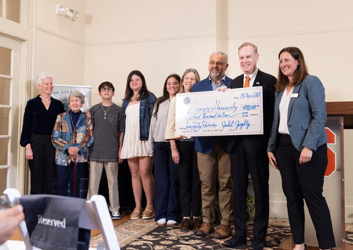 Zoghby Family presents a check to Chancellor Kent Syverud