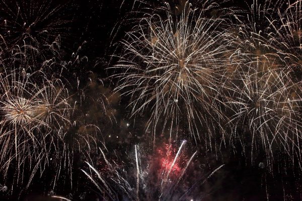 Colorful fireworks explode in the sky
