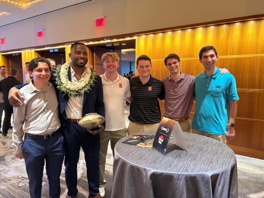 Falk College sport analytics students at UFL championship game.