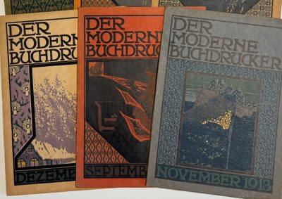 Three vintage German art magazines titled "Der Moderne Buchdrucker" (The Modern Printer) from different months - December, September, and November 1918 - featuring Art Nouveau-style covers with decorative typography and illustrations including winter scenes, geometric patterns, and nature motifs.