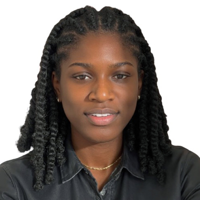 Professional headshot of a student with braided hair wearing a dark collared shirt and gold necklace against a white background.