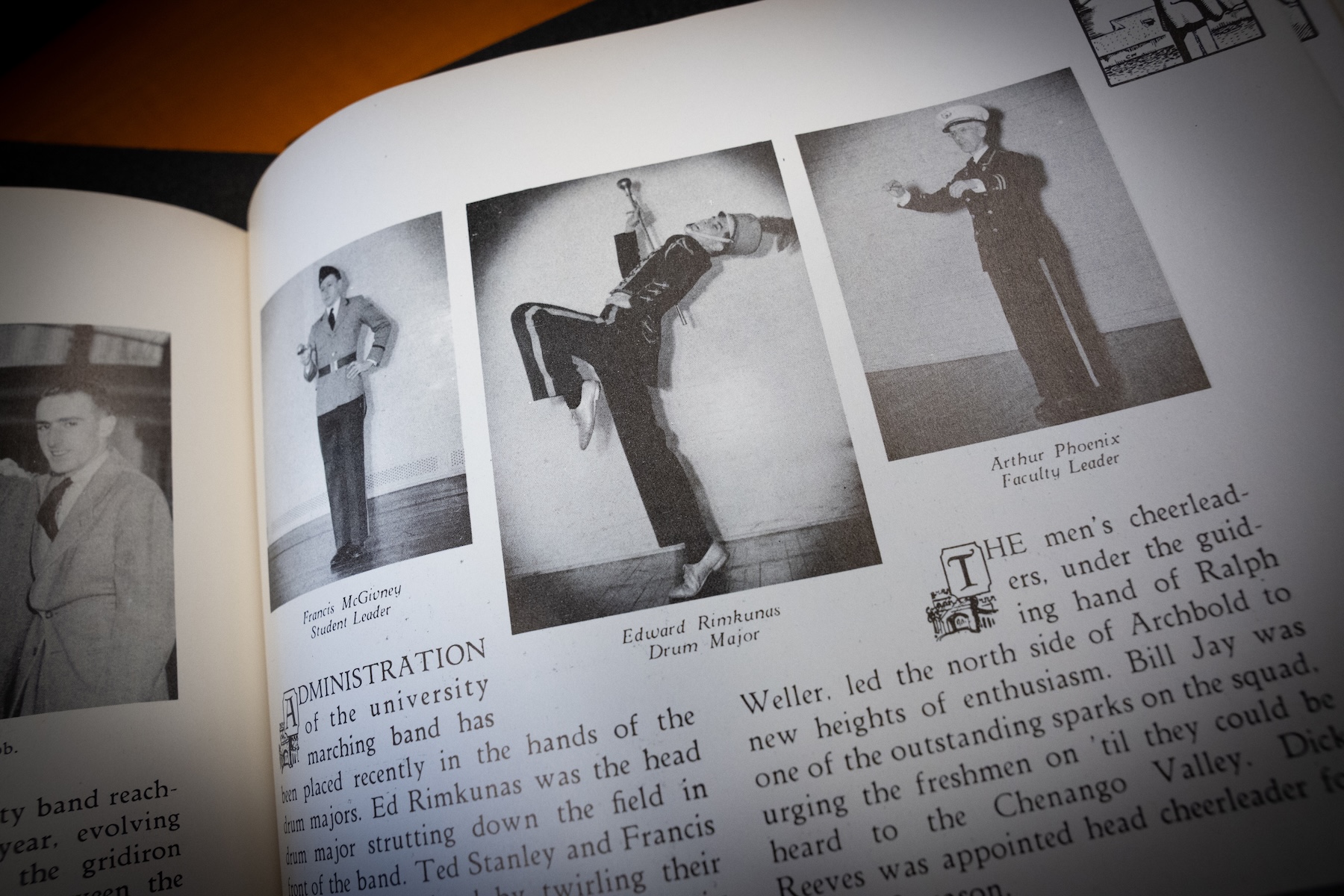 Black-and-white yearbook page showing three uniformed marching band leaders.