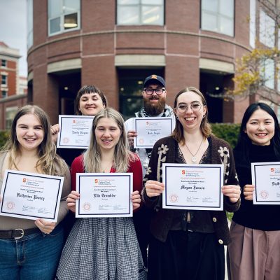 Six Buckley Award recipients in the College of Visual and Performing Arts stand outside the Shaffer Art Building