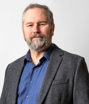 William F. Polsgrove, man in blue shirt with grey jacket