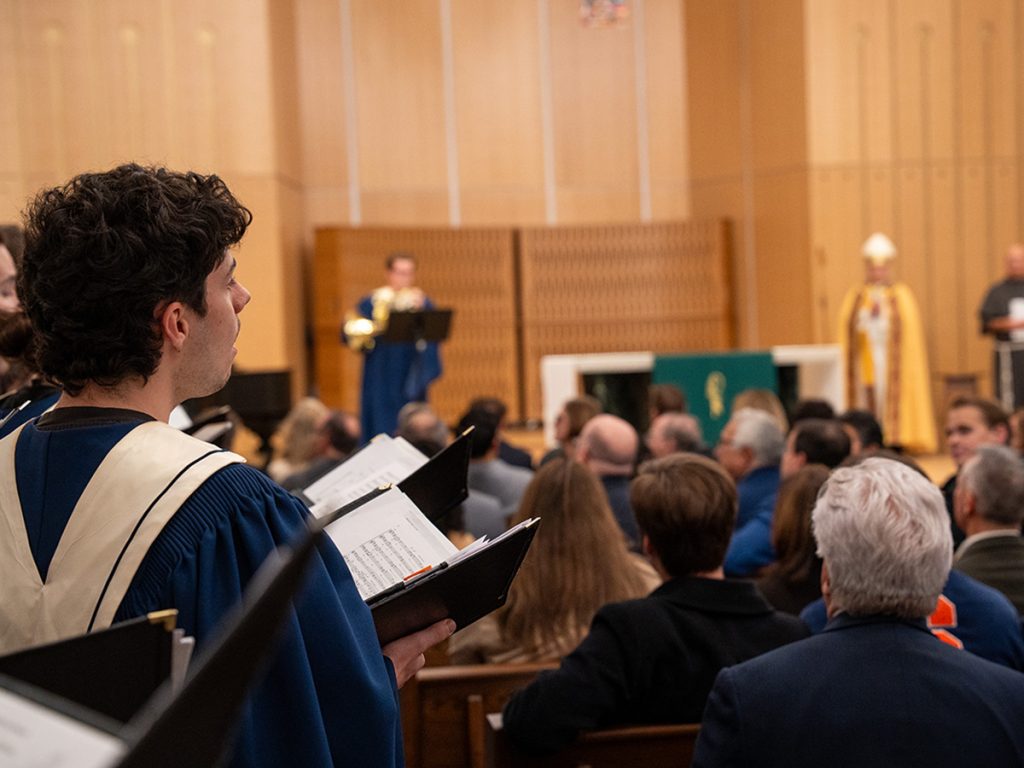 Members of the Hendricks Chapel Choir sing during the dedication of the Catholic Center