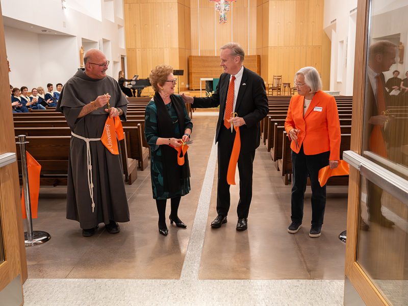 Ribbon cutting at the Catholic Center, Father Gerry Waterman, Judith, Chancellor Kent Syverud and Dr. Ruth Chen