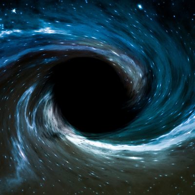 Black hole with luminous blue and white accretion disk swirling in star-filled space.