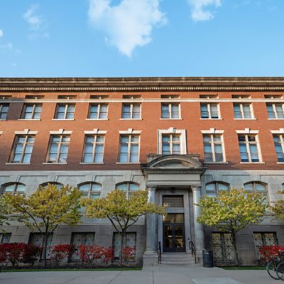 Red brick and sandstone exterior of Slocum Hall