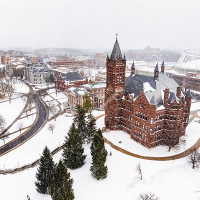 Aerial view of snow-covered Syracuse University campus