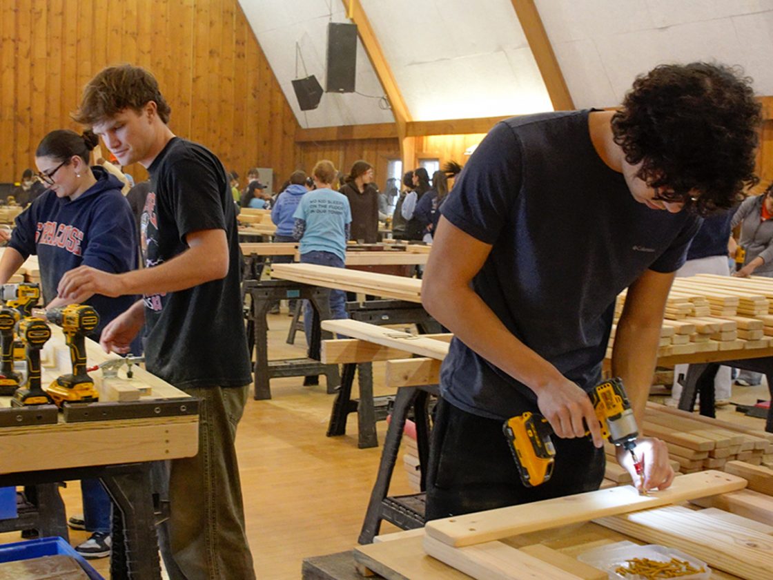 A Place to Rest Their Heads: Students Build 116 Beds for Syracuse Children