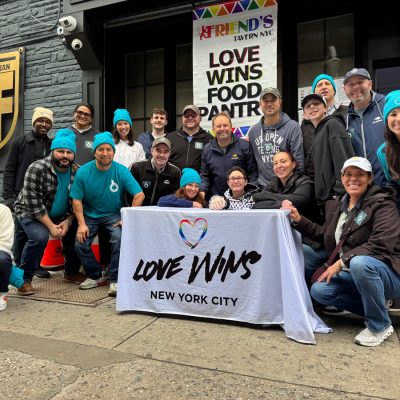 People gathered outside a food pantry to distribute meals