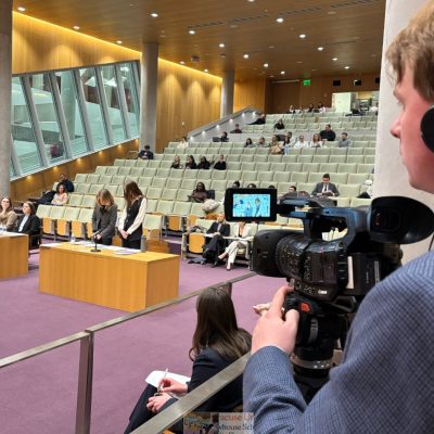 Student behind camera in courtroom
