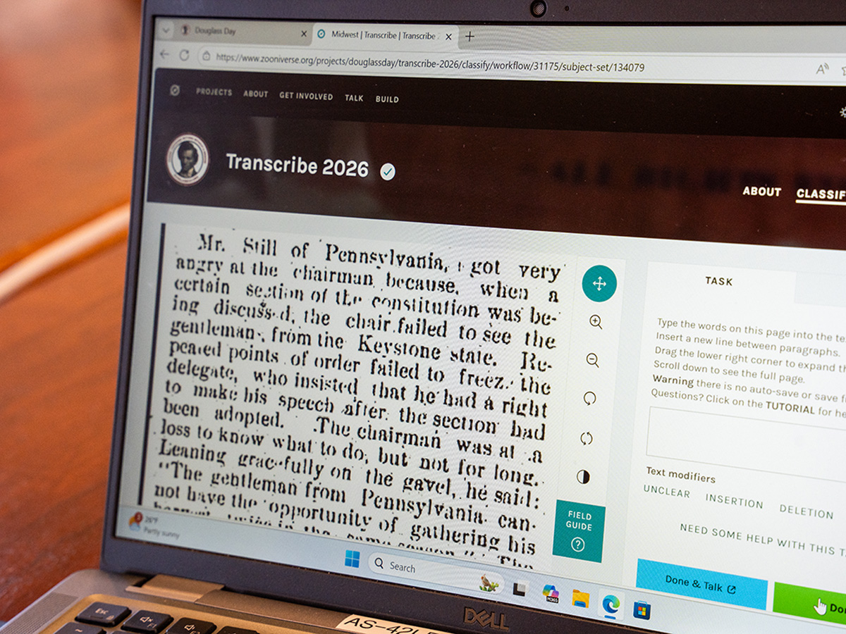 Text appears on a laptop computer screen