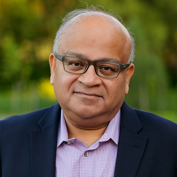 headshot of Devashish Mitra, professor at Syracuse University.