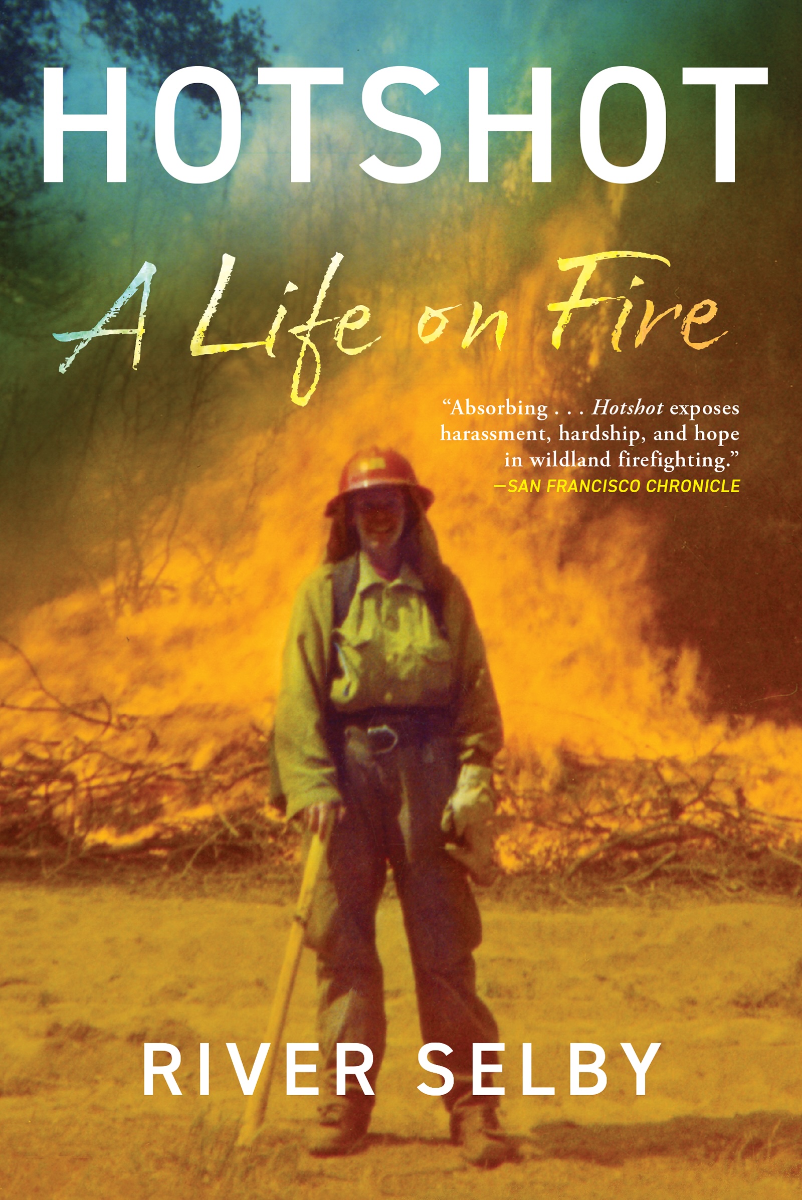 A nonfiction cover showing a firefighter standing in front of a large wildfire, with text in white and yellow.