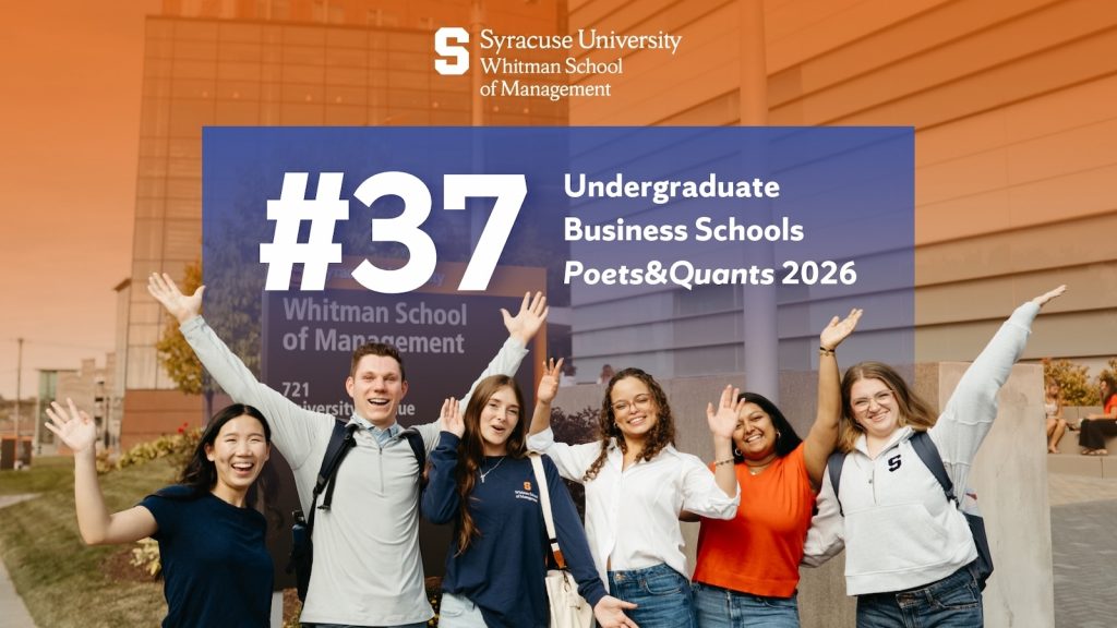 Group of students standing outside Syracuse University’s Whitman School of Management, raising their arms in celebration in front of a large sign displaying “#37 Undergraduate Business Schools, Poets&Quants 2026.”