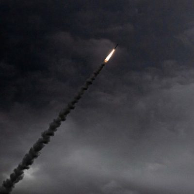 A missile launches through dark, cloudy skies leaving a trail of smoke, during U.S. air defense operations in the Central Command area of responsibility during Operation Epic Fury, April 2, 2026.