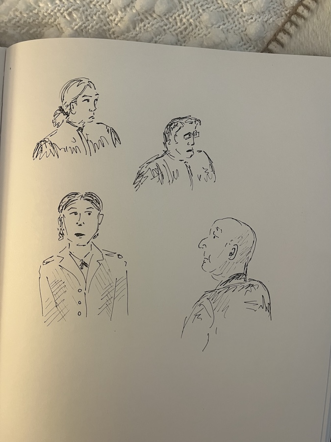 Notebook page with several black-ink portrait sketches of people observed during a court proceeding
