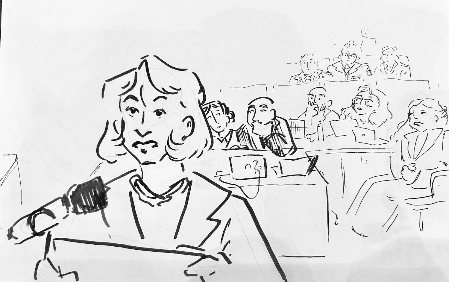 Black-ink drawing of a person speaking into a microphone at a podium, with audience members sketched behind.