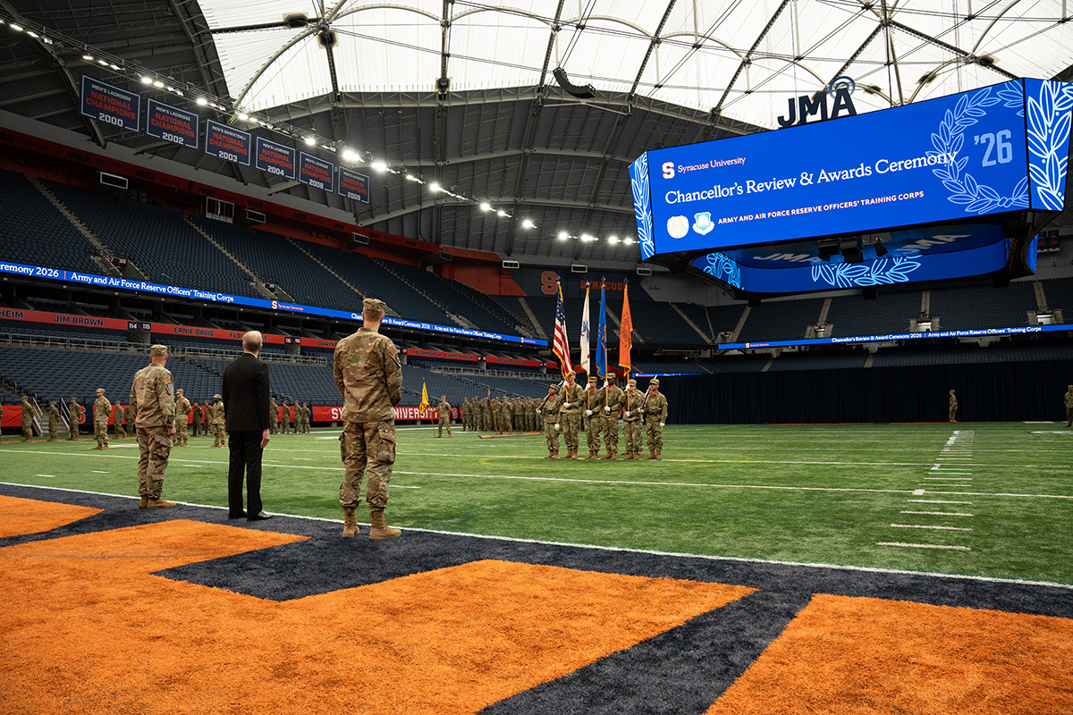 ROTC cadets stand at attention during the Syracuse University Chancellor’s Review ceremony inside JMA Wireless Dome