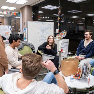 Students collaborate in a discussion at the LaunchPad.