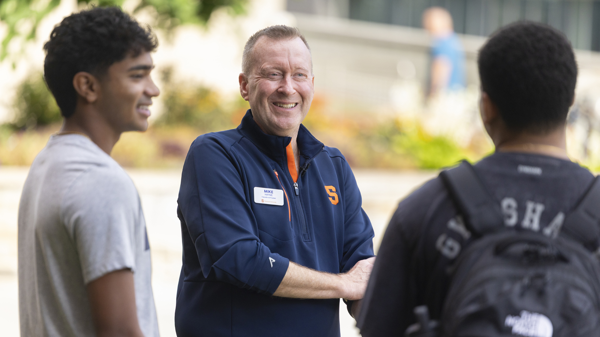 The Chancellor greets students during campus move-in.
