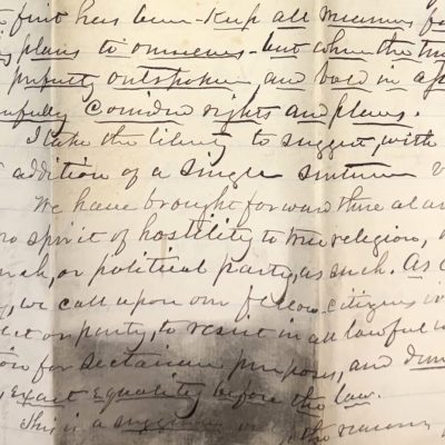 Handwritten 1870 letter with visible staining and discoloration before conservation treatment.